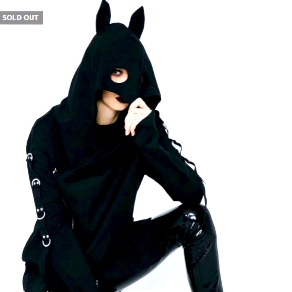 Super cool and edgy hoodie/jacket with tons of metal detail. Very avant-